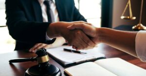 lawyer closing a debt settlement deal