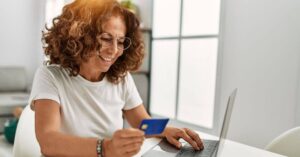 woman entering credit card information online