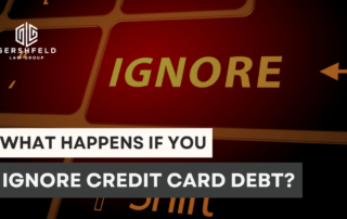 Keyboard with the word “IGNORE” highlighted in yellow, symbolizing the dangers of avoiding or neglecting credit card debt.